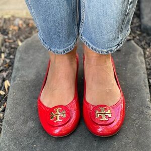 Tory Burch Glossy Red Flats with Gold Emblem